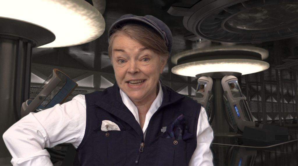 Genial woman in gardener's clothes inside a spaceship.
